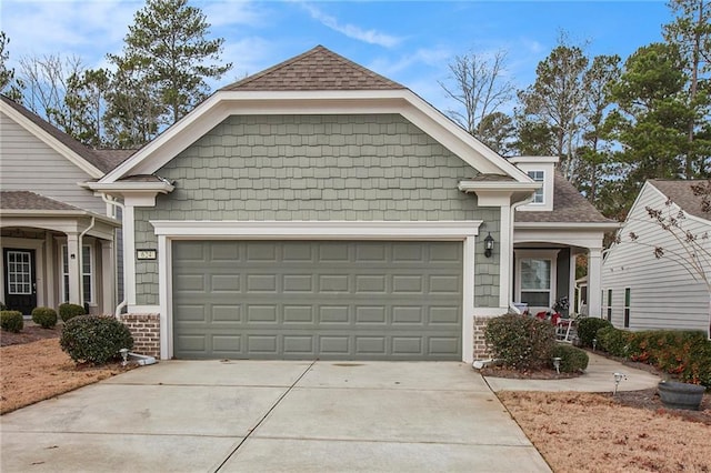 view of front of property with a garage