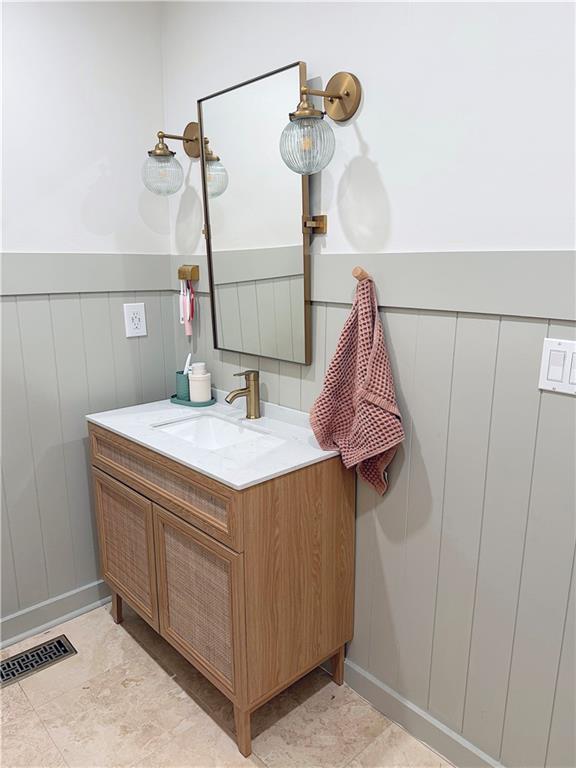 2193 Kildare Way NW, Kennesaw, GA 30152 - bathroom with vanity and wainscoting
