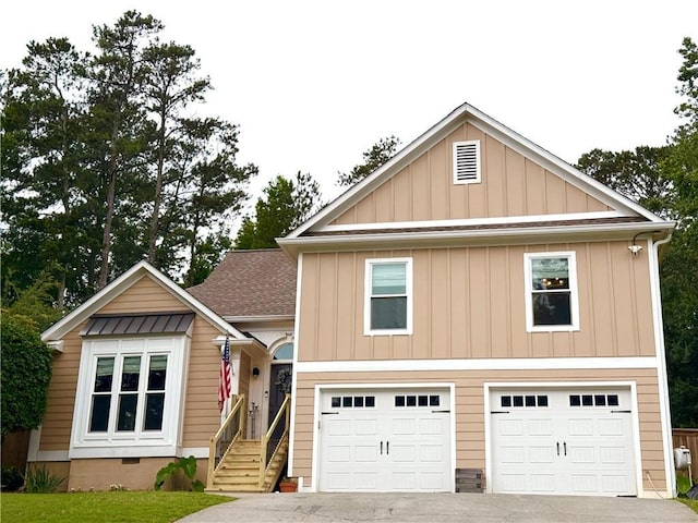 2193 Kildare Way NW, Kennesaw, GA 30152 - view of front facade with driveway, board and batten siding, a garage, and a shingled roof