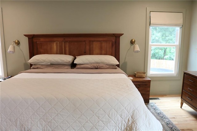 2193 Kildare Way NW, Kennesaw, GA 30152 - bedroom featuring multiple windows and light wood-style flooring