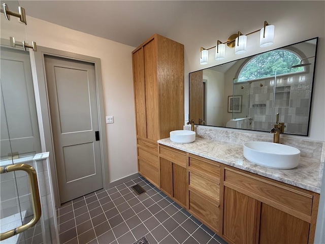 2193 Kildare Way NW, Kennesaw, GA 30152 - bathroom featuring double vanity, tile patterned floors, and a shower with door