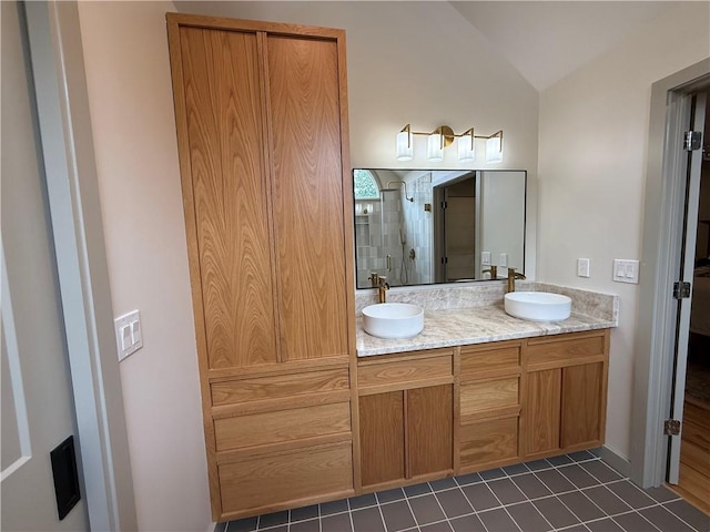 2193 Kildare Way NW, Kennesaw, GA 30152 - full bathroom featuring lofted ceiling, double vanity, tile patterned floors, and a shower