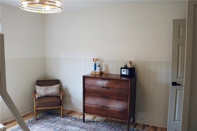 2193 Kildare Way NW, Kennesaw, GA 30152 - living area featuring a wainscoted wall and wood finished floors