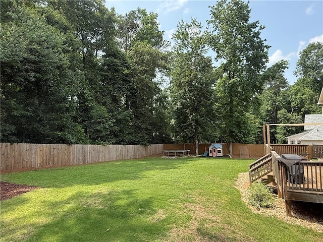 2193 Kildare Way NW, Kennesaw, GA 30152 - rear view of house with a hot tub, a chimney, and a wooden deck
