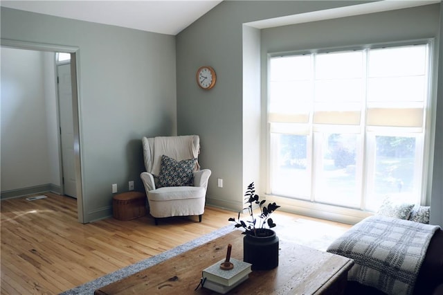 2193 Kildare Way NW, Kennesaw, GA 30152 - sitting room with plenty of natural light, wood finished floors, and baseboards
