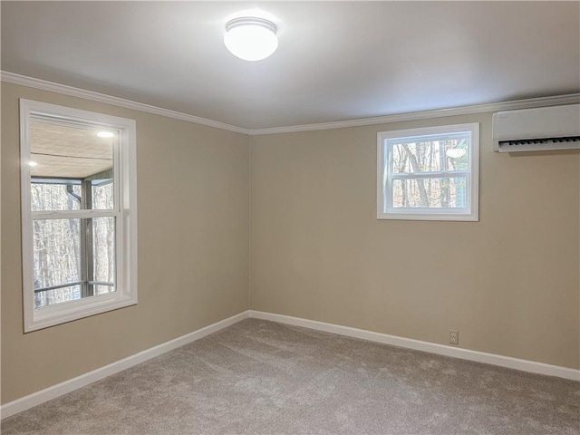 spare room with baseboards, a wall mounted air conditioner, a wealth of natural light, and crown molding