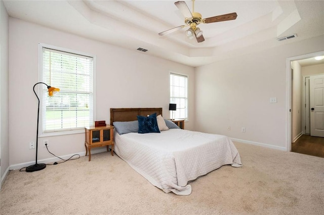 409 Cold Springs Ln, Mcdonough, GA 30252 - bedroom with a raised ceiling, carpet, and baseboards