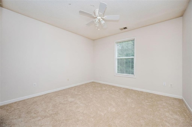 409 Cold Springs Ln, Mcdonough, GA 30252 - carpeted empty room featuring baseboards and ceiling fan