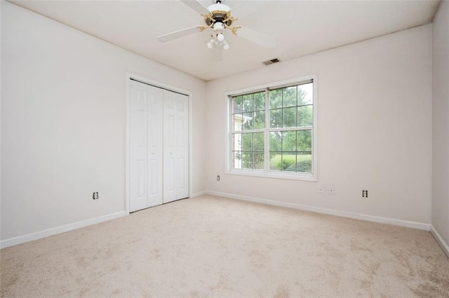 409 Cold Springs Ln, Mcdonough, GA 30252 - unfurnished bedroom featuring baseboards, carpet floors, a closet, and ceiling fan