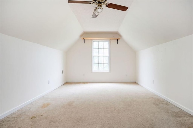 409 Cold Springs Ln, Mcdonough, GA 30252 - additional living space with carpet, a ceiling fan, vaulted ceiling, and baseboards