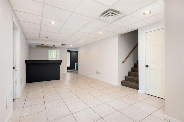409 Cold Springs Ln, Mcdonough, GA 30252 - unfurnished living room with stairway, baseboards, light tile patterned flooring, a paneled ceiling, and recessed lighting