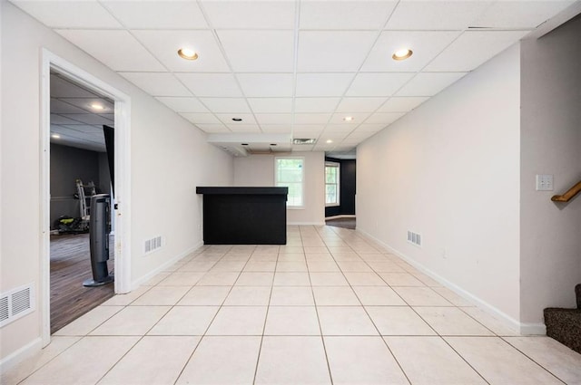 409 Cold Springs Ln, Mcdonough, GA 30252 - unfurnished living room with stairs, recessed lighting, a drop ceiling, and baseboards