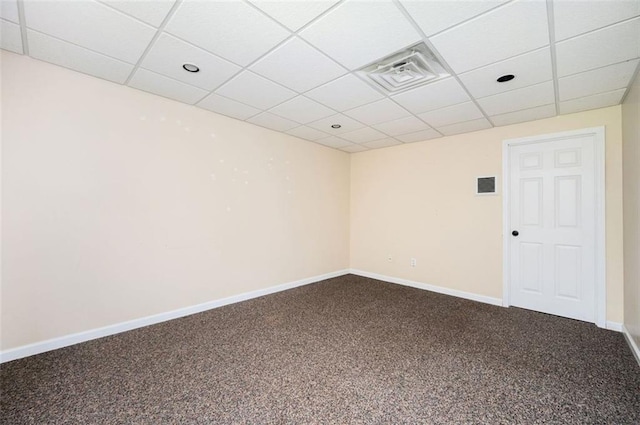 409 Cold Springs Ln, Mcdonough, GA 30252 - spare room featuring dark carpet, a drop ceiling, baseboards, and recessed lighting