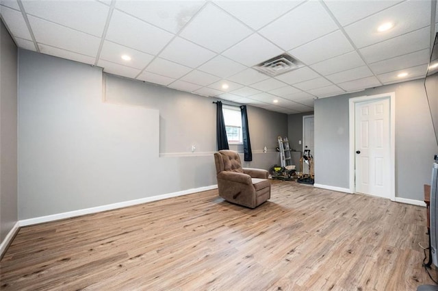 409 Cold Springs Ln, Mcdonough, GA 30252 - living area with wood finished floors, baseboards, recessed lighting, and a drop ceiling