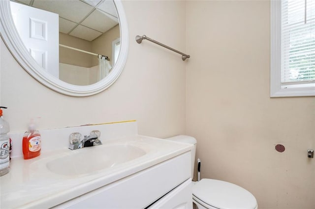 409 Cold Springs Ln, Mcdonough, GA 30252 - full bathroom with vanity, toilet, a drop ceiling, and a shower with shower curtain