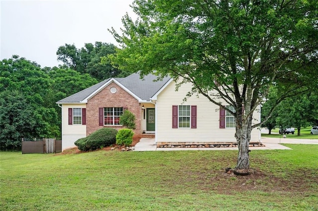409 Cold Springs Ln, Mcdonough, GA 30252 - view of front of house featuring a front lawn and brick siding