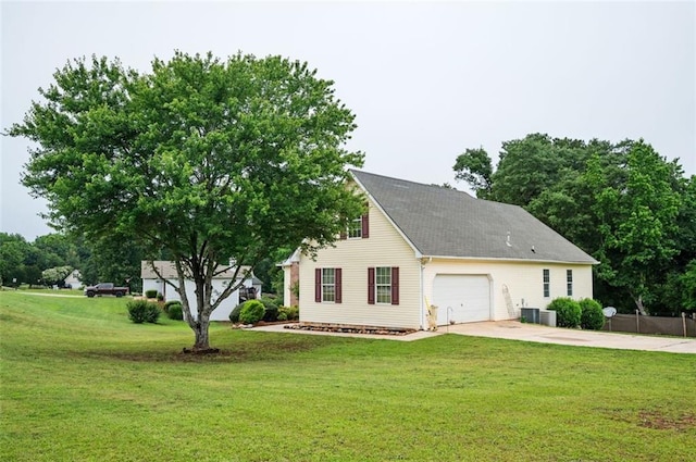 409 Cold Springs Ln, Mcdonough, GA 30252 - view of front facade with concrete driveway, a front yard, and a garage