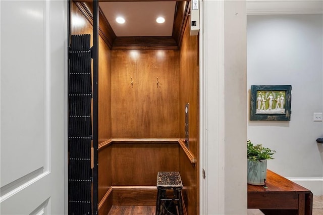 122 Old Ivy Rd NE Unit 17, Atlanta, GA 30342 - elevator featuring ornamental molding and recessed lighting