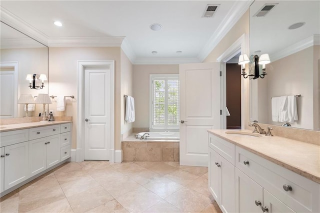 122 Old Ivy Rd NE Unit 17, Atlanta, GA 30342 - bathroom featuring two vanities, a bath, ornamental molding, a chandelier, and tile patterned floors
