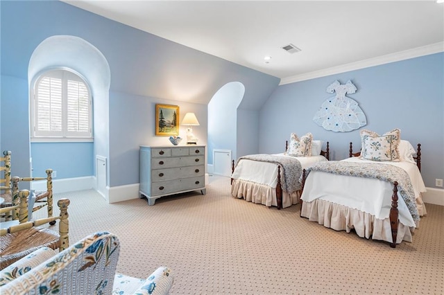122 Old Ivy Rd NE Unit 17, Atlanta, GA 30342 - bedroom with carpet, lofted ceiling, baseboards, and ornamental molding