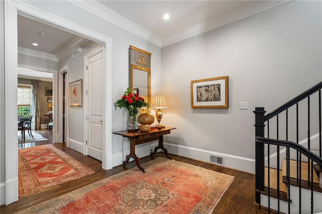 122 Old Ivy Rd NE Unit 17, Atlanta, GA 30342 - hall featuring wood finished floors, stairway, ornamental molding, recessed lighting, and baseboards