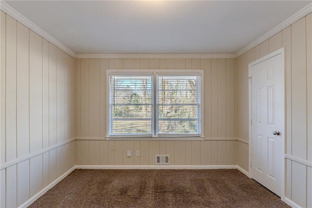 carpeted empty room with ornamental molding