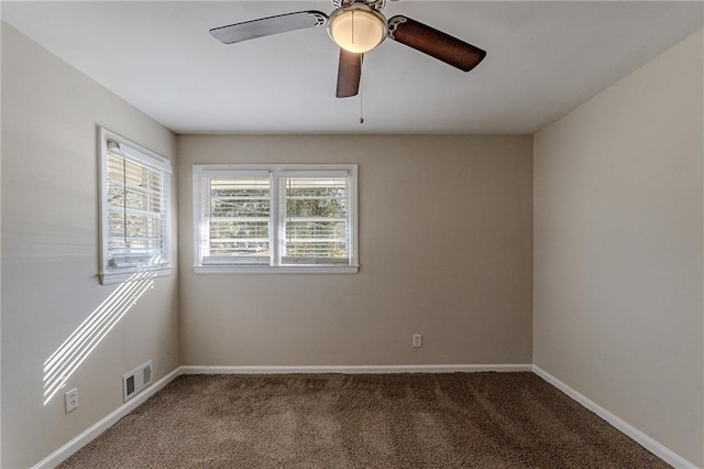 carpeted empty room with ceiling fan