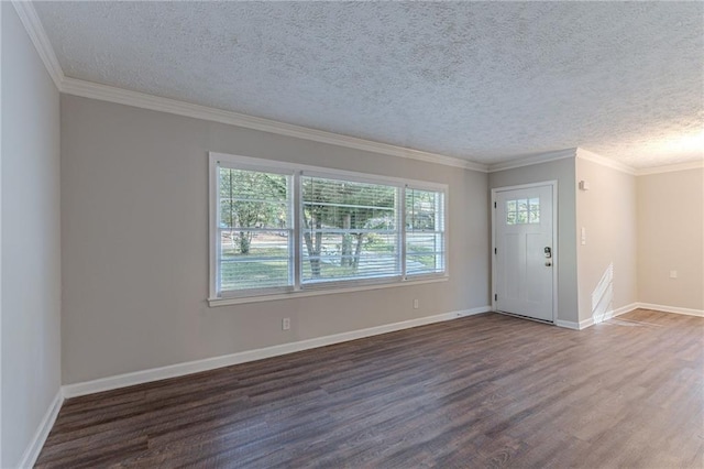 interior space featuring a textured ceiling, dark hardwood / wood-style floors, and ornamental molding