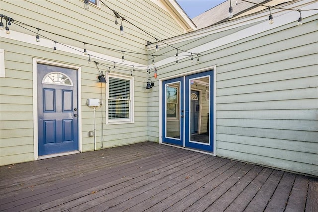 wooden terrace featuring french doors