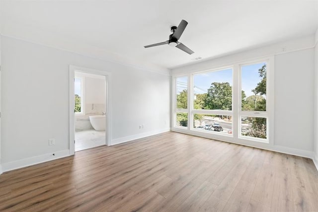 interior space featuring ceiling fan and light hardwood / wood-style floors