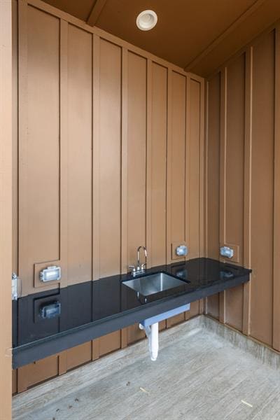 bathroom featuring sink and hardwood / wood-style flooring