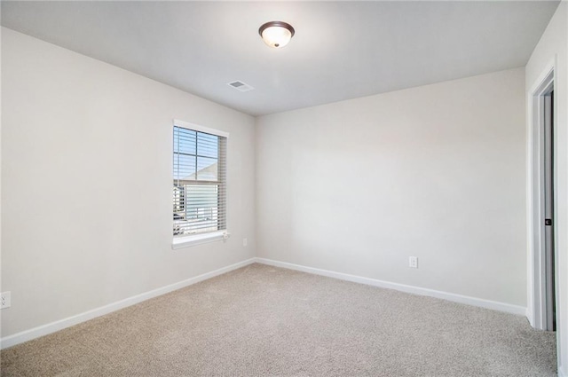 2291 Elise Way, Hampton, GA 30228 - empty room with carpet floors and baseboards