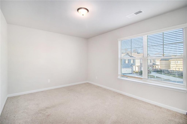 2291 Elise Way, Hampton, GA 30228 - unfurnished room featuring healthy amount of natural light and carpet