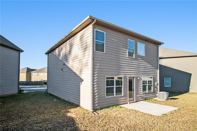 2291 Elise Way, Hampton, GA 30228 - rear view of house with a patio area and a yard