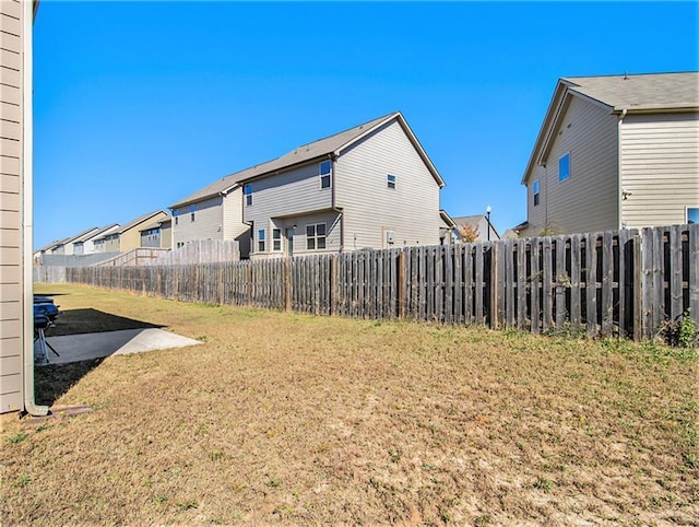 2291 Elise Way, Hampton, GA 30228 - fenced backyard featuring a residential view and a patio area