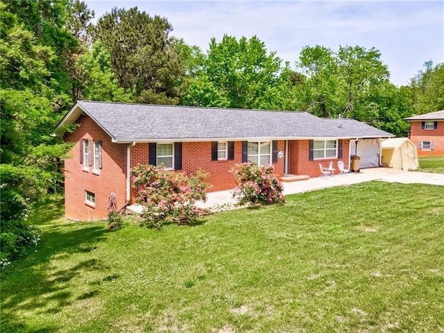 ranch-style house with a porch and a front yard