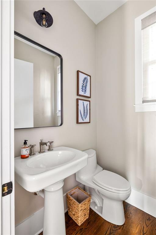 9129 Selborne Ln, Chattahoochee Hills, GA 30268 - bathroom with toilet and wood-type flooring