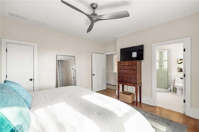 9129 Selborne Ln, Chattahoochee Hills, GA 30268 - bedroom featuring dark hardwood / wood-style floors, ensuite bath, and ceiling fan