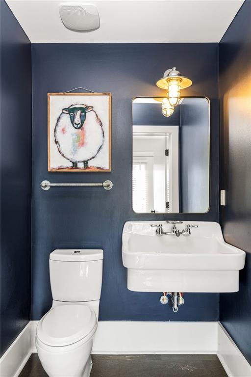9129 Selborne Ln, Chattahoochee Hills, GA 30268 - bathroom featuring toilet and sink