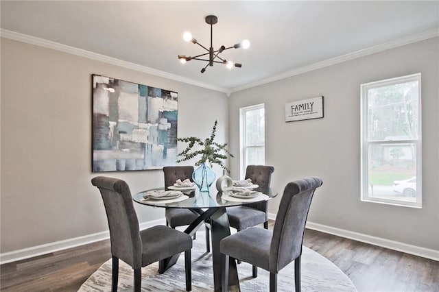 783 Lost Creek Cir, Stone Mountain, GA 30088 - dining space with a chandelier, wood finished floors, ornamental molding, and baseboards