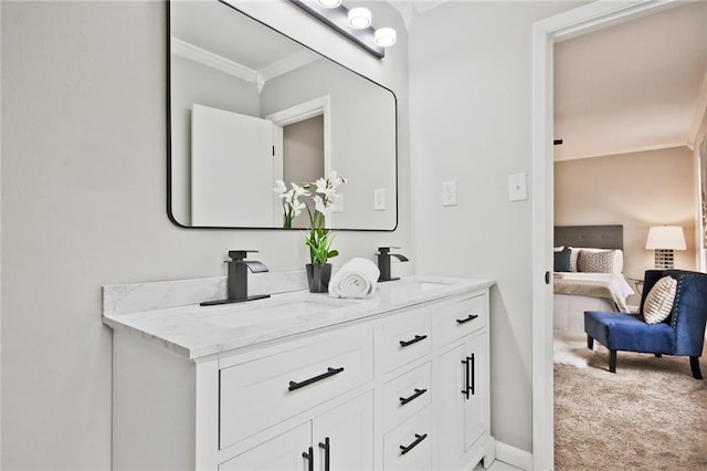 783 Lost Creek Cir, Stone Mountain, GA 30088 - ensuite bathroom with ornamental molding, double vanity, and baseboards