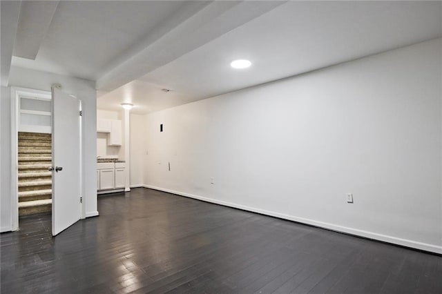 783 Lost Creek Cir, Stone Mountain, GA 30088 - unfurnished living room featuring stairs, dark wood-style floors, baseboards, and recessed lighting