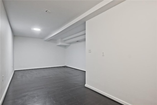 783 Lost Creek Cir, Stone Mountain, GA 30088 - spare room with baseboards and dark wood-style flooring