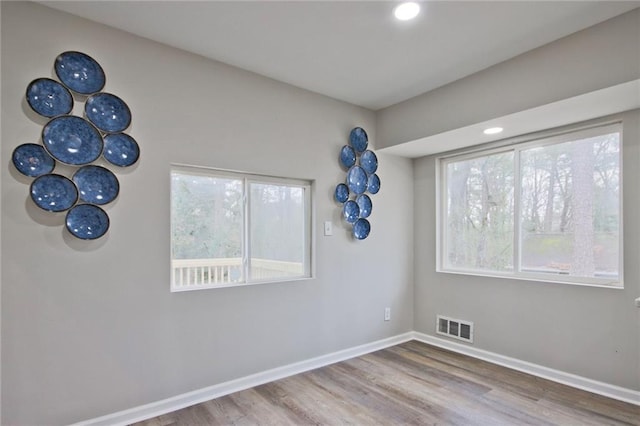 783 Lost Creek Cir, Stone Mountain, GA 30088 - unfurnished room featuring wood finished floors, baseboards, and recessed lighting