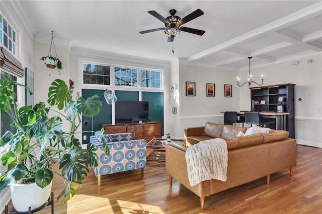 living room featuring ornamental molding, coffered ceiling, beamed ceiling, and wood finished floors