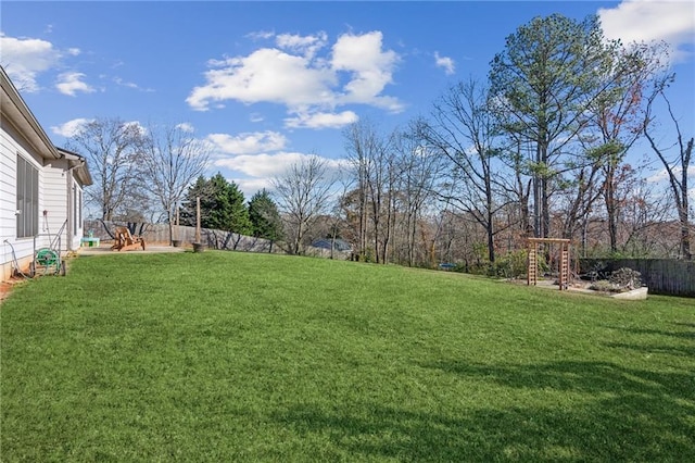 view of yard with fence