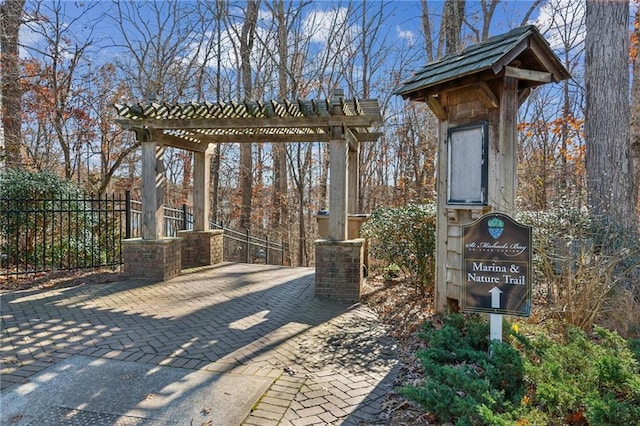 view of patio with fence and a pergola