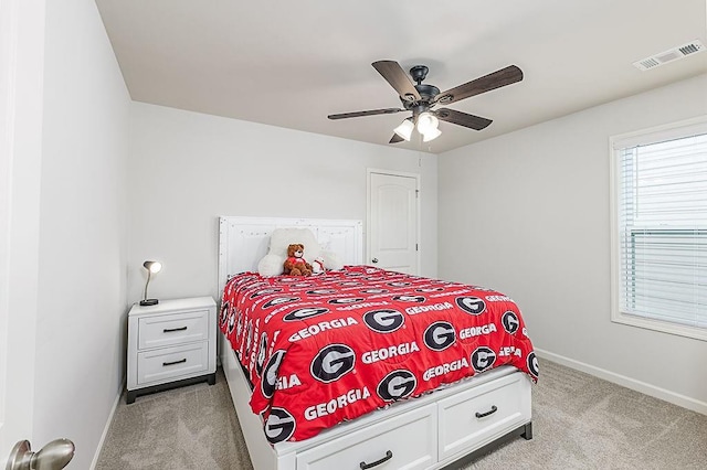 895 Garnet Dr, Acworth, GA 30101 - bedroom featuring light colored carpet and ceiling fan
