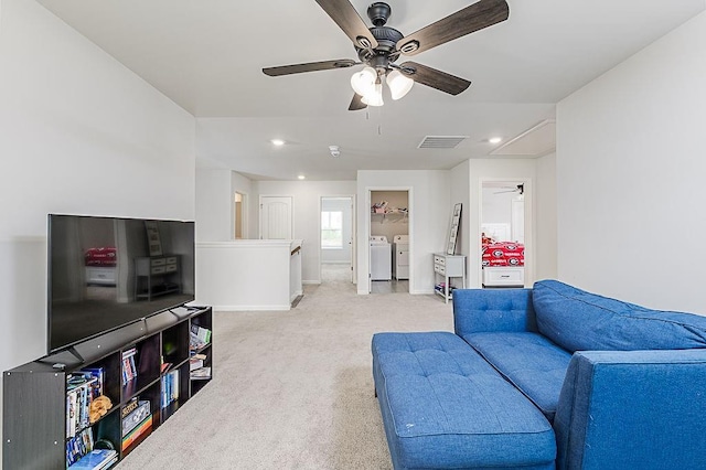 895 Garnet Dr, Acworth, GA 30101 - living area with separate washer and dryer, a ceiling fan, light colored carpet, and recessed lighting