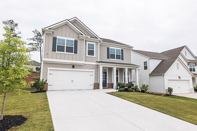 895 Garnet Dr, Acworth, GA 30101 - craftsman inspired home with board and batten siding, a porch, a front yard, and concrete driveway